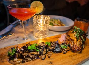 Hen of the woods mushroom, Campari daiquiri and sweet potato gnocchi at Tremont Cafe