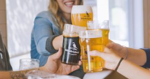 four hands cheering whisky jack beer