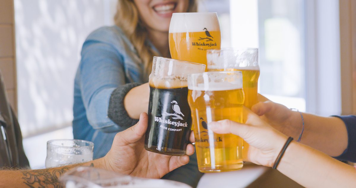 four hands cheering whisky jack beer