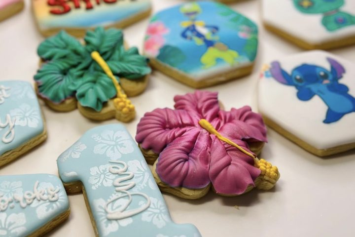cookies iced in a Lilo and Stitch theme for a first birthday